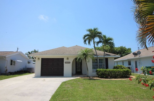 Naples Park House | Perfect recipe for relaxing, heated pool, walk to beach, bikes, stunning sunsets