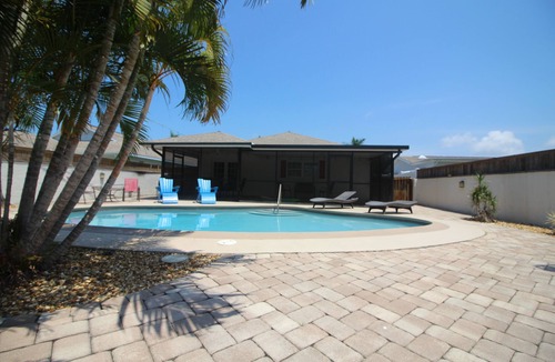 Naples Park House | Perfect recipe for relaxing, heated pool, walk to beach, bikes, stunning sunsets
