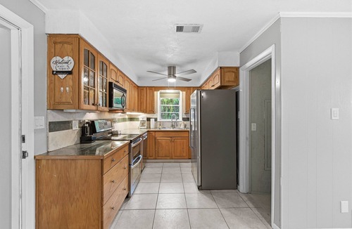 Port Orange House | Pet-Friendly 5BR Retreat w/2 Kitchens + Sleeps 13