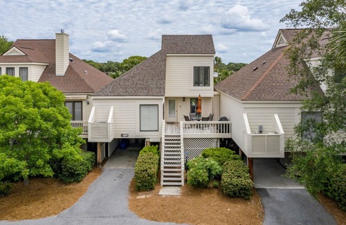 Spinnaker Beachhouses Villa | Pet Friendly! Walk to Pelican Beach, Pools, Golf, Dining! Amenity access included!
