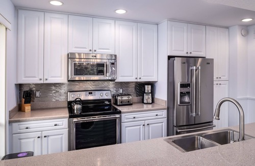 Hunt Club Condo | PGA National Home on Squire Golf Course 180º Water Views by Guaranteed Rental™