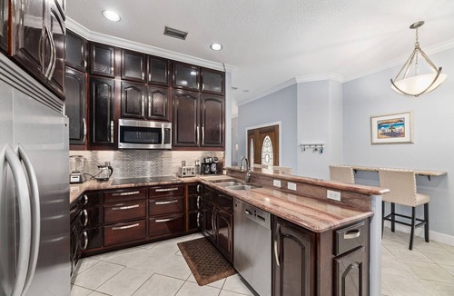 Banana River Estates House | Pier Beach House! Heated Pool, Spa, Steps to Sand