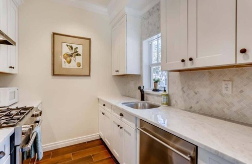 Grandview Heights House | Pink House - Bask in Style Steps from the Convention Center
