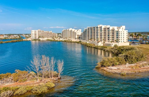Hudson Apartment | Pool and Beach Access Waterfront Hudson Condo!