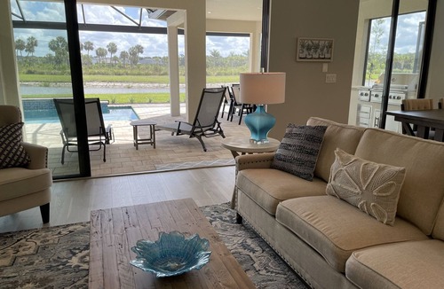 Sarasota House | Pool House Overlooking Lake on Skye Ranch