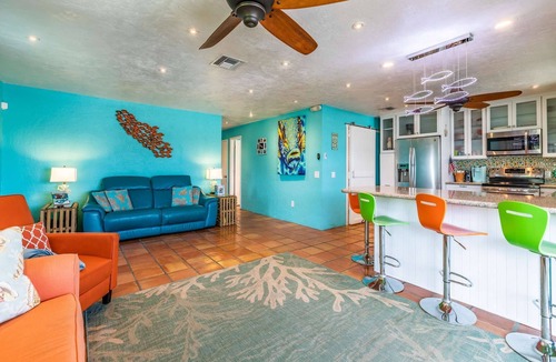 Pine Channel Estates House | Prime Time: A Tropical Paradise on Big Pine Key, Canal Front Duplex, Swift Access to Atlantic & Gulf