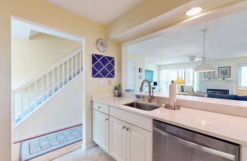 Heron Harbour Isle House | Pristine bay front townhome in Ocean City: Sweeping views, modern amenities
