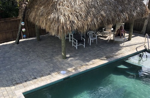 Port Canaveral House | Private Beach House Oasis! Heated Pool, Spa, Tiki hut, Ocean few houses away