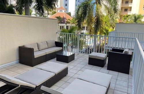Vanderbilt Beach Condo | Private extended deck with steps down to the pool! - REG 5-205