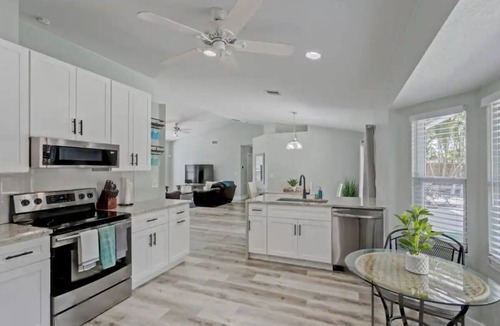 Royal Palm Beach House | Private Home with Oasis Backyard w/Pool, BBQ, King Beds