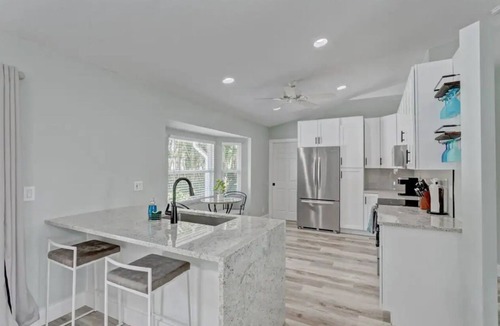 Royal Palm Beach House | Private Home with Oasis Backyard w/Pool, BBQ, King Beds
