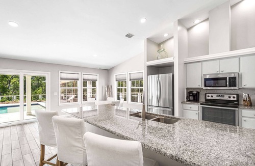 Sugarwood Beach House | Private Outdoor Oasis with Pool. 2 Minutes to Beach. LSV and Bikes