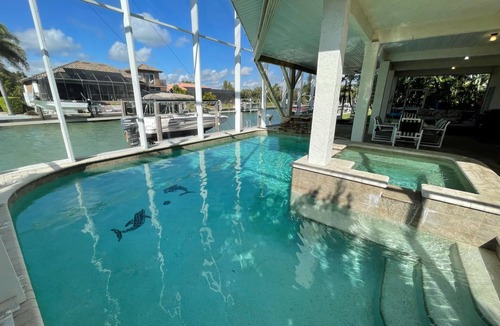 Isles of Capri House | Private Waterfront home with pool and hot tub with large dock in Isle of Capri