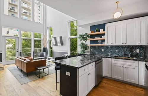 Midtown Apartment | Prominent King Bed Double Story Midtown Loft