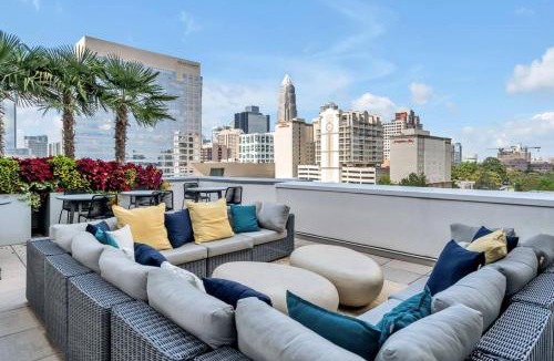 Second Ward Apartment | Queen City Haven - Free Parking, Pool, Balcony
