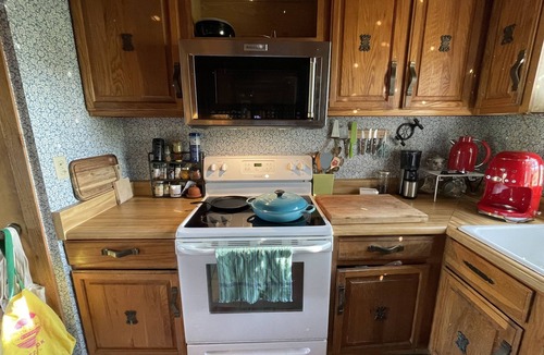 Frank House | Quiet mountain retreat with artist workspace, playroom, office and views