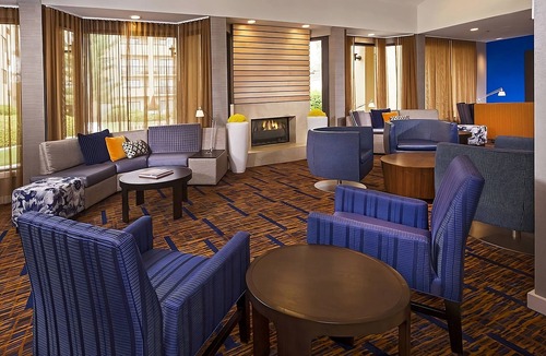 University Place Hotel | Recharge on a Pet Friendly Suite & Access to Pool |Near Charlotte Motor Speedway