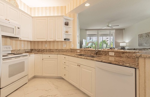 Vanderbilt Beach Condo | Regatta -Resort Style: 3BR/2BA -Lanai w/dining/conversational seating/pool view