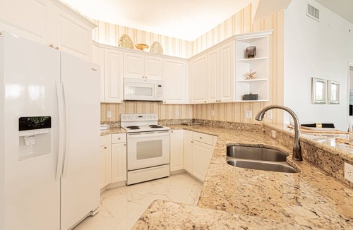 Vanderbilt Beach Condo | Regatta -Resort Style: 3BR/2BA -Lanai w/dining/conversational seating/pool view