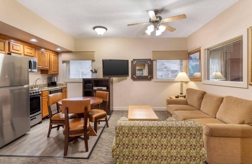 Pittman Center Hotel | Relax in a Stylish Suite with Full Kitchen and Beautiful Scenic Views
