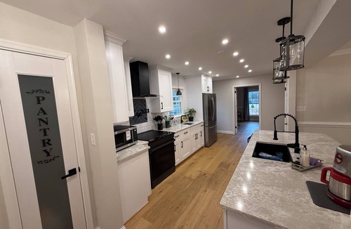 Gloucester Point House | Relax in our renovated get away that is only steps away from a secluded beach.