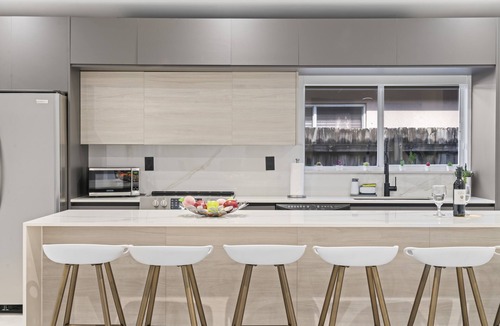 Richmond West House | Relax in Style: Pool, Golf, Luxe Kitchen, Sleeps 12