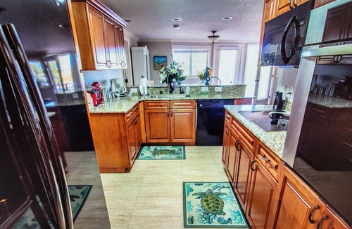 Signal Cove House | Relax in the Dolphin Retreat! Waterfront house with dock and kayaks.