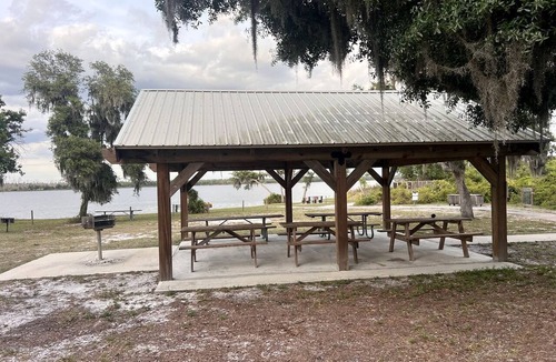 Braden River RV Rental | Relaxing Safari Tent with Fire Pit Near Anna Maria Island in Bradenton, Florida