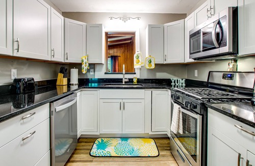 Garden City House | Remodeled home with pool/guest house, new pool, lovely yard & bright interior