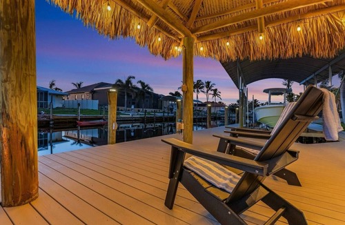 Yacht Club House | Renovated 3-bed, 2-bath home with pool, dock, bar, patio, and waterfront access.