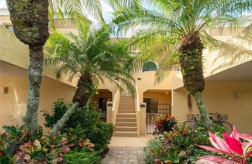 Pelican Bay Condo | Renovated Beachwalk 3 Bedroom Condo -5 minute walk to Beach!