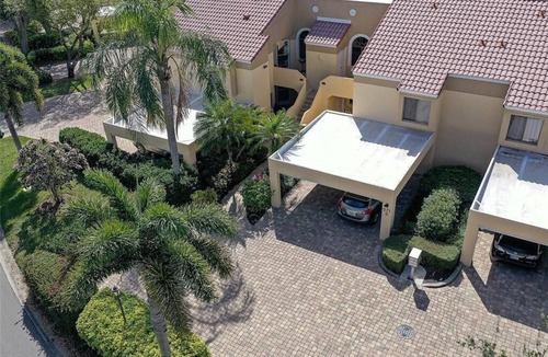 Pelican Bay Condo | Renovated Beachwalk 3 Bedroom Condo -5 minute walk to Beach!