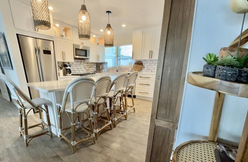 New Smyrna Beach House | Renovated, direct oceanfront 5BR/6BA private pool home sleeps 16.