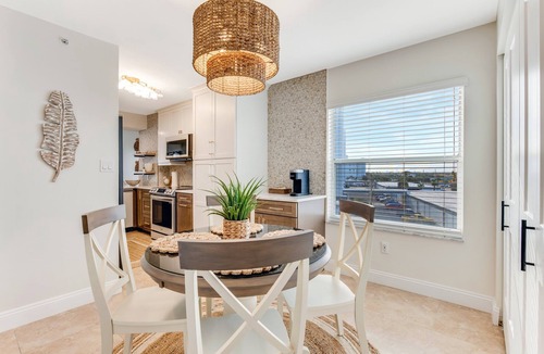 Seawinds Condo Condo | Renovated direct oceanfront corner condo with a large balcony, heated pool, and garage