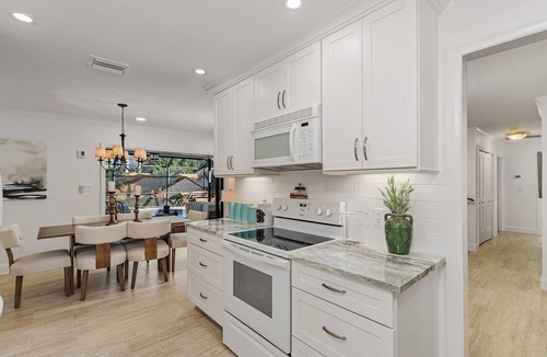 Moorings Villa | Renovated Villa less than 1 mile to beach with Pool & Spa! Dog Friendly!