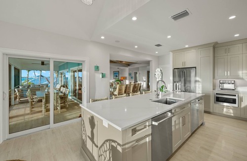Captiva House | RENT NOW! NEW, WATERFRONT HOME, IN VILLAGE, POOL, HOT TUB, DOCK, PUTTING GREEN!