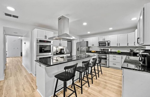 Indian Trails House | Reunion - Sleeps 26 hot tub 10 br 8 ba 6 mile beach