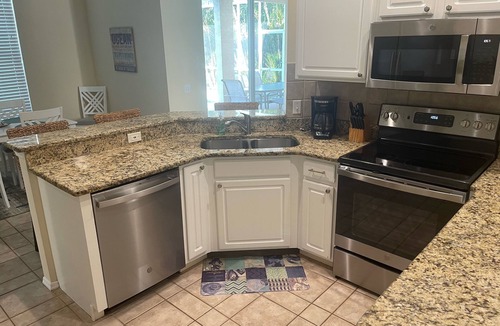 River Pointe House | River Pointe Lakefront 3 BR Ranch Home with Heated Pool