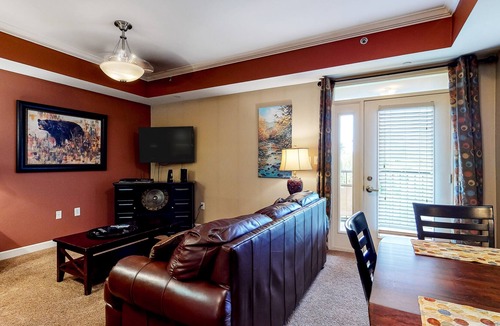 Sevierville Condo | Riverfront condo w/ shared pool/hot tub & private balcony - near attractions!
