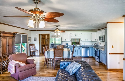 Elizabethton House | Riverfront home with dock, mountain view, grill, firepit, smart TVs