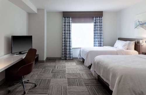 North Little Rock Hotel | Riverwalk Basecamp: Indoor Heated Pool, Minutes to Big Dam Bridge.