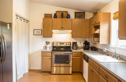 St. George Island House | Rosemary is secluded, fenced, pet friendly with kayaks, close to beach and bay!