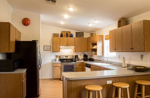 St. George Island House | Rosemary is secluded, fenced, pet friendly with kayaks, close to beach and bay!
