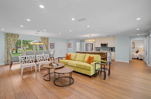 Kings Lake House | Rovigo Vacation Rental: Spacious Retreat with Panoramic Lake Views in Kings Lake. 4-BR, 4-Bathroom Home with Private Pool, just 3.4 Miles from the Vibrant Fifth Avenue South and Naples Attractions