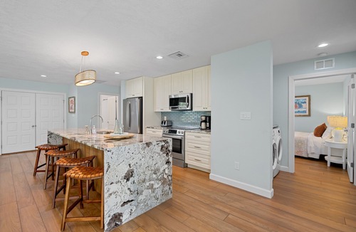Kings Lake House | Rovigo Vacation Rental: Spacious Retreat with Panoramic Lake Views in Kings Lake. 4-BR, 4-Bathroom Home with Private Pool, just 3.4 Miles from the Vibrant Fifth Avenue South and Naples Attractions