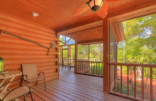 Lake Helen Apartment | Rustic Cabin Retreat in the Antiques Room at the Cabin On The Lake!