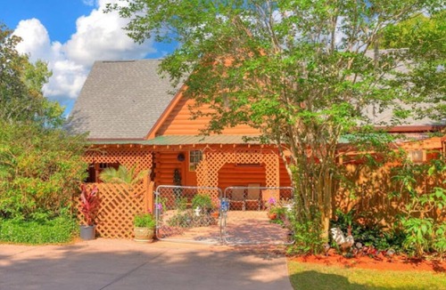 Lake Helen Apartment | Rustic Cabin Retreat in the Antiques Room at the Cabin On The Lake!