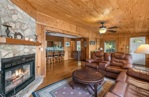 Sunset Cove Cottage | Rustic Cozy Cabin Lakefront Water Trampoline