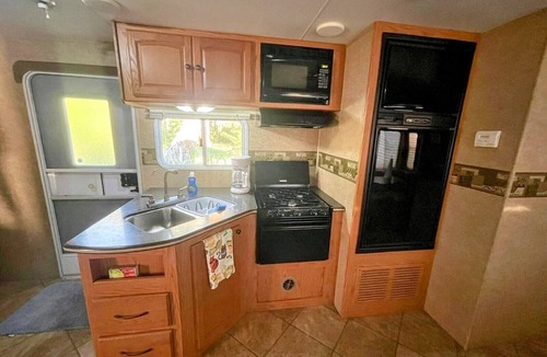 New Smyrna Beach House | RV NSB Sun & Shade Tree, Pool & Picnic RV Vacation
