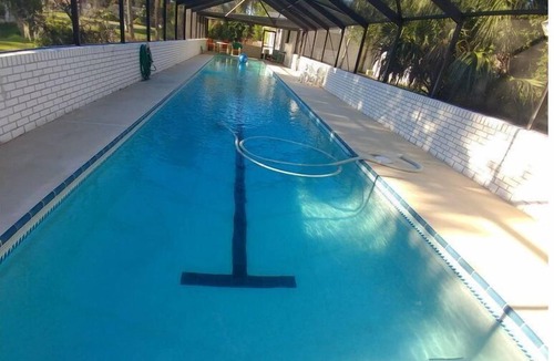 New Smyrna Beach House | RV NSB Sun & Shade Tree, Pool & Picnic RV Vacation